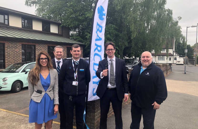 Alex Burghart MP with Barclays staff at St Peter's Church, Hutton