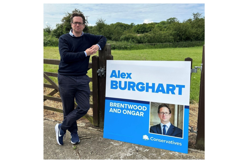 Alex Burghart MP while on campaign trail