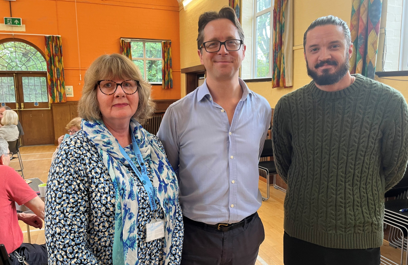 Alex Burghart MP with Kate Watson and Ian Rogers from Parkinsons UK