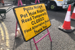 pothole repair sign KB