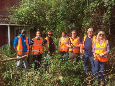 Conservative Councillors help with clearing overgrown gardens