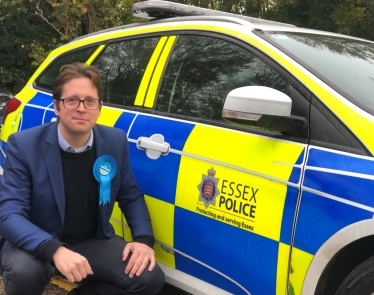 Alex Burghart and Essex Police Vehicle