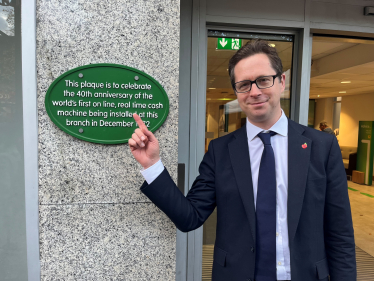 Alex Burghart at the Brentwood Lloyds ATM plaque