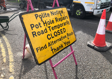 pothole repair sign KB