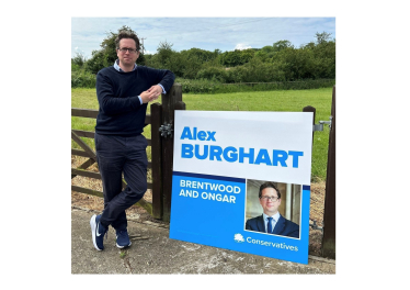 Alex Burghart MP while on campaign trail